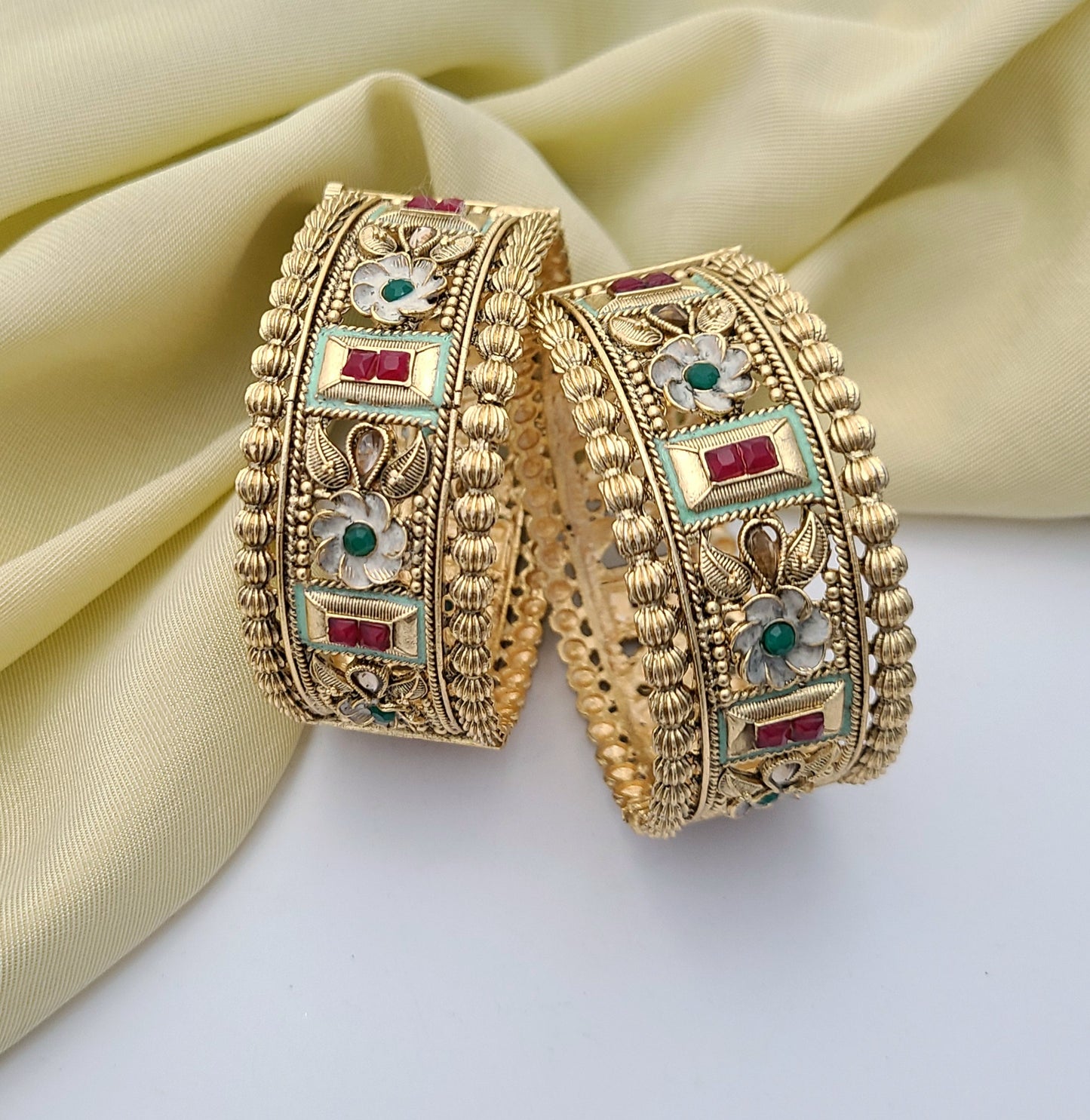 Grand Gold Bangles with Floral & Enamel Accents