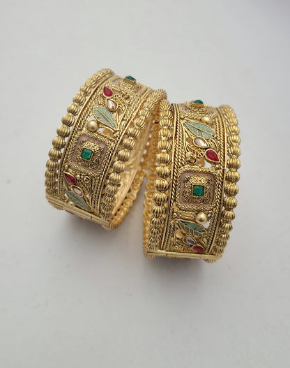 Elegant Gold Bangles with Floral & Enamel Detailing