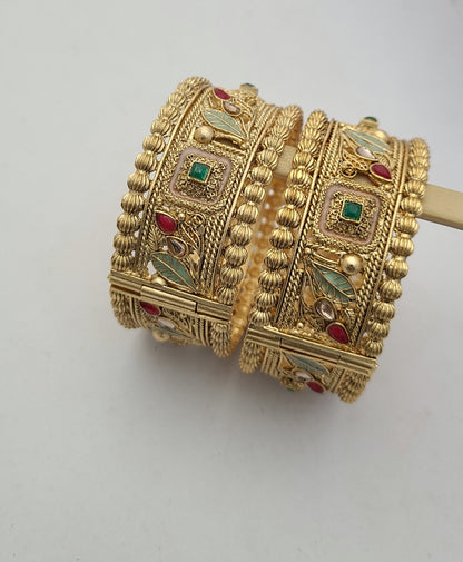 Elegant Gold Bangles with Floral & Enamel Detailing