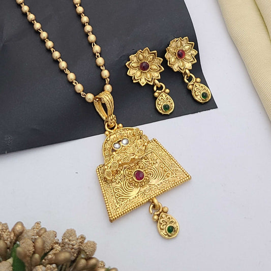 Traditional gold-plated Pandent necklace set with red and green stone detailing, paired with matching earrings – perfect imitation jewellery for women | RC Imitation Jewellery