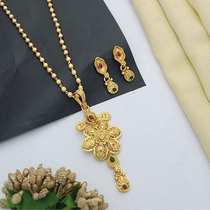 Traditional gold-plated Pandent necklace set with red and green stone detailing, paired with matching earrings – perfect imitation jewellery for women | RC Imitation Jewellery
