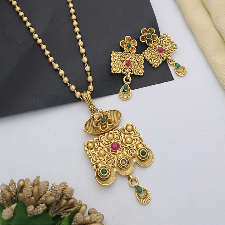 Traditional gold-plated Pandent necklace set with red and green stone detailing, paired with matching earrings – perfect imitation jewellery for women | RC Imitation Jewellery