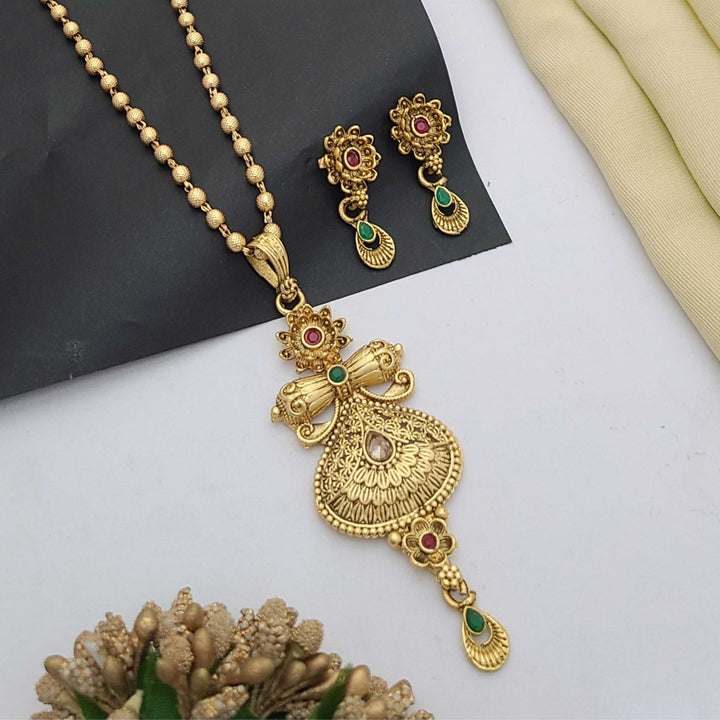 Traditional gold-plated Pandent necklace set with red and green stone detailing, paired with matching earrings – perfect imitation jewellery for women | RC Imitation Jewellery