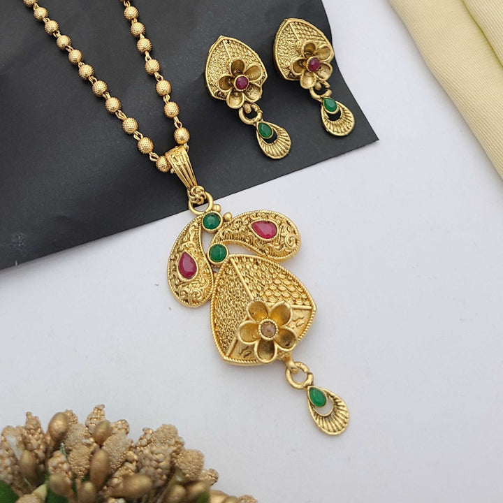 Traditional gold-plated Pandent necklace set with red and green stone detailing, paired with matching earrings – perfect imitation jewellery for women | RC Imitation Jewellery