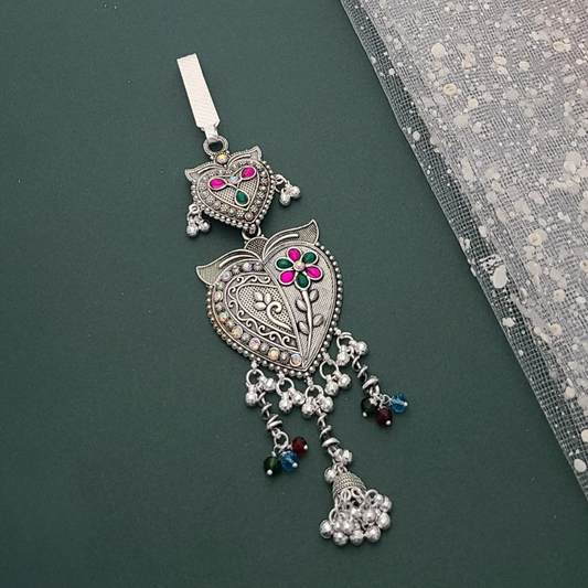 Traditional silver-colored Juda waist accessory with intricate floral and chain design, perfect for bridal and festive outfits