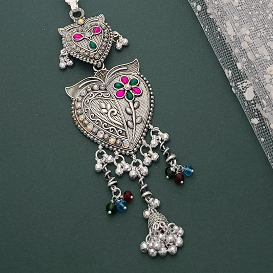 Traditional silver-colored Juda waist accessory with intricate floral and chain design, perfect for bridal and festive outfits