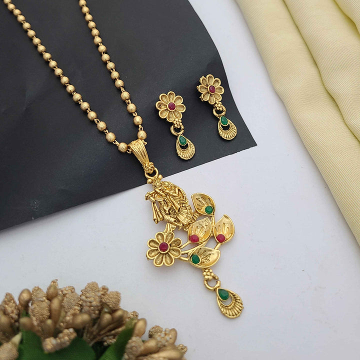 Traditional gold-plated Pandent necklace set with red and green stone detailing, paired with matching earrings – perfect imitation jewellery for women | RC Imitation Jewellery