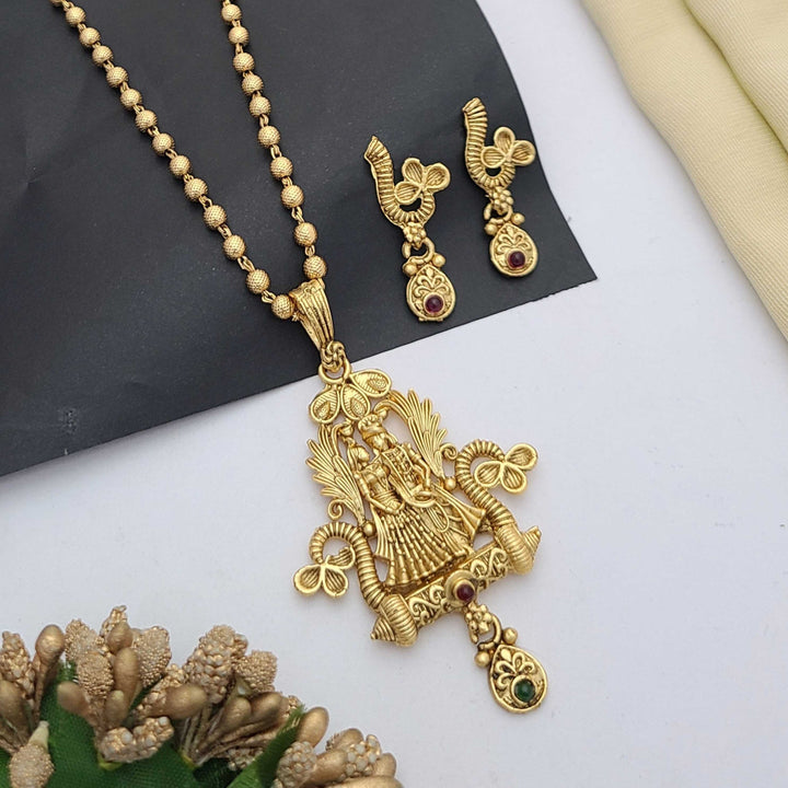 Traditional gold-plated Pandent necklace set with red and green stone detailing, paired with matching earrings – perfect imitation jewellery for women | RC Imitation Jewellery