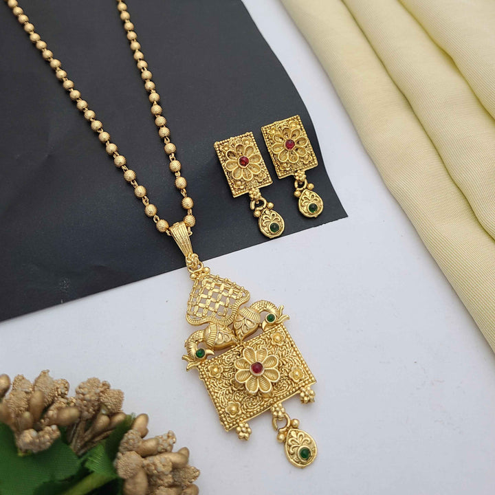 Traditional gold-plated Pandent necklace set with red and green stone detailing, paired with matching earrings – perfect imitation jewellery for women | RC Imitation Jewellery