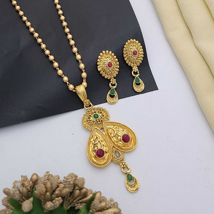 Traditional gold-plated Pandent necklace set with red and green stone detailing, paired with matching earrings – perfect imitation jewellery for women | RC Imitation Jewellery