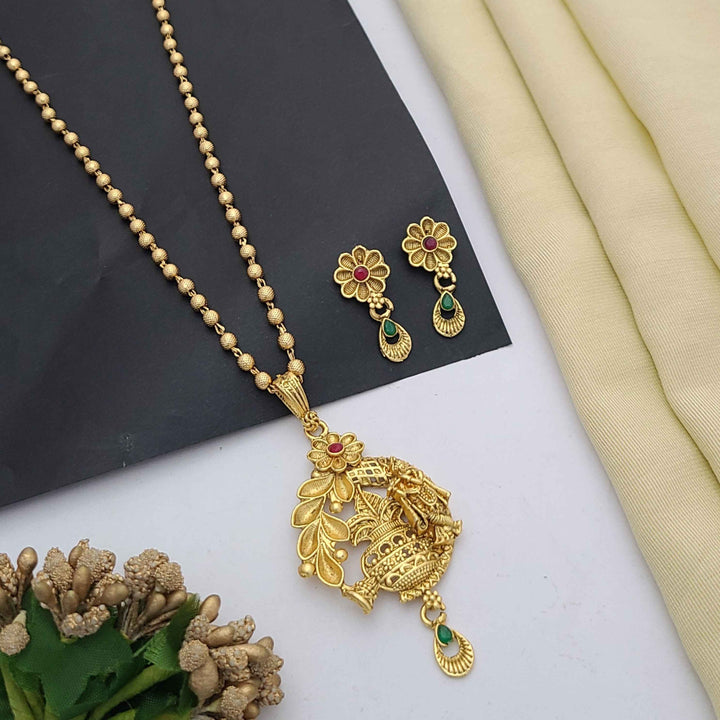 Traditional gold-plated Pandent necklace set with red and green stone detailing, paired with matching earrings – perfect imitation jewellery for women | RC Imitation Jewellery