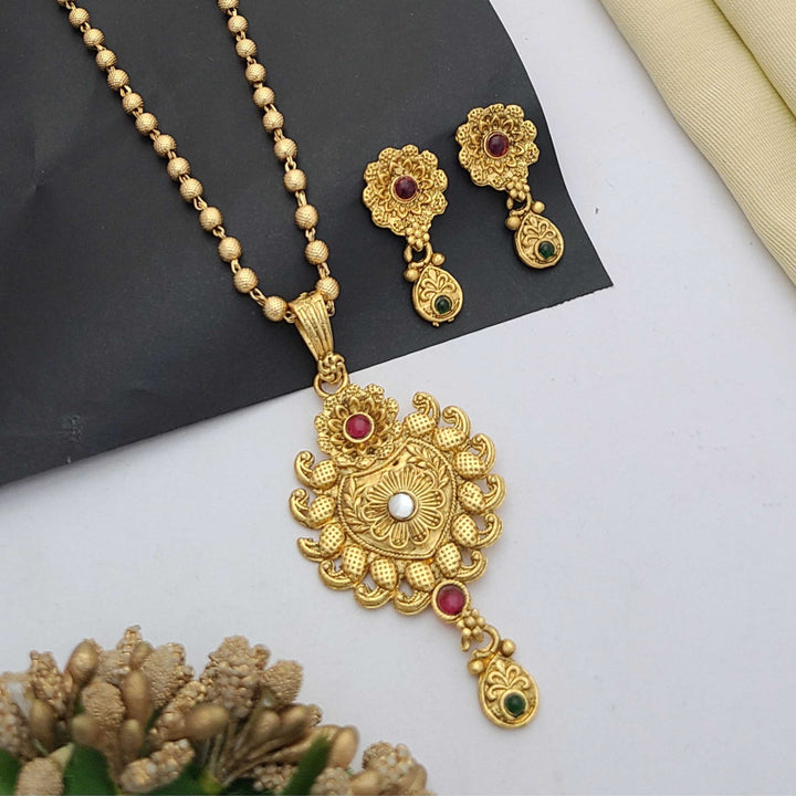 Traditional gold-plated Pandent necklace set with red and green stone detailing, paired with matching earrings – perfect imitation jewellery for women | RC Imitation Jewellery